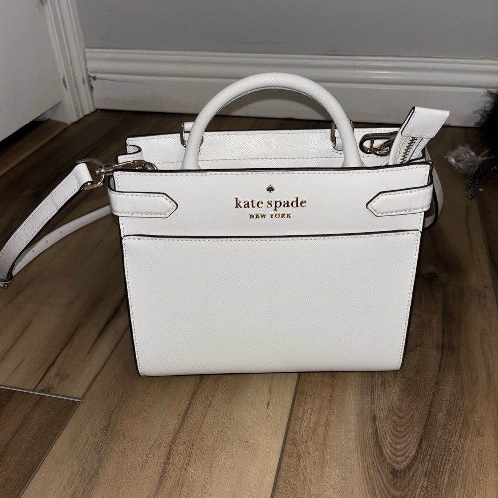 Kate Spade White purse. Has cross body handle attached can be removed